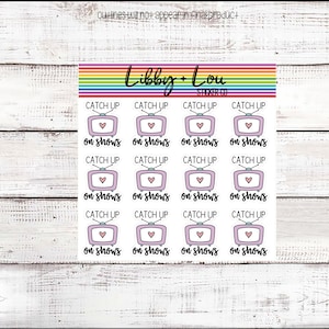 May include: A sheet of 12 stickers featuring a pink television with a heart on the screen and the text "Catch Up On Shows". The stickers are arranged in a grid of four rows and three columns.
