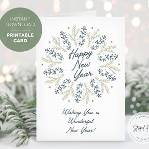 May include: A white greeting card with a circular floral design in blue and gold, with the words "Happy New Year" in the center. The card also includes the text "Wishing You a Wonderful New Year!" and "Instant Download Printable Card."