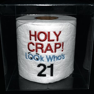 Holy Crap 21st birthday embroidered toilet paper in clear gift box. Perfect gag gift, table decoration, or party centerpiece decoration!