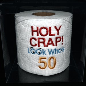 Holy Crap 50th birthday embroidered toilet paper in clear gift box. Perfect gag gift, table decoration, or party centerpiece decoration!
