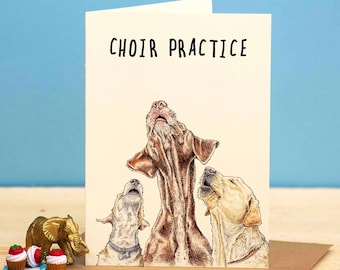 May include: A greeting card with the text "CHOIR PRACTICE" and an illustration of three dogs singing. The dogs are a brown and white pointer, a white labrador, and a brown and white terrier.