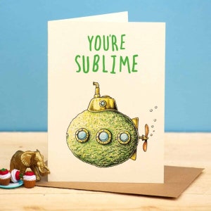 May include: A greeting card with a green submarine illustration and the text "You're Sublime".