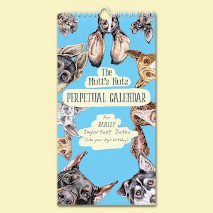 May include: A perpetual calendar titled "The Mutt's Nuts" with a blue background and illustrations of various dog breeds. The calendar includes the text "For REALLY Important Dates (Like your dog's birthday)". It is spiral-bound with a hole for hanging.