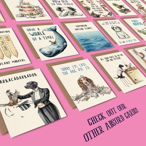 May include: A collection of humorous greeting cards featuring illustrations of animals and funny sayings. The cards are printed on brown paper with white text and are arranged in a fan shape on a pink background. The text on the cards includes phrases like "Have a whale of a time!" and "Sorry it's late, the dog ate it!"