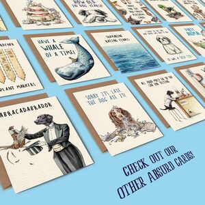May include: A collection of humorous greeting cards featuring illustrations of dogs and other animals. The cards have a variety of funny captions, such as "Have a Whale of a Time!" and "Sorry It's Late, The Dog Ate It!"