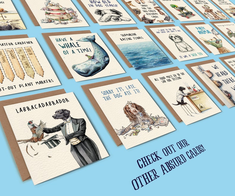 May include: A collection of humorous greeting cards featuring illustrations of dogs and other animals. The cards have a variety of funny captions, such as "Have a Whale of a Time!" and "Sorry It's Late, The Dog Ate It!"