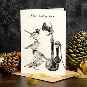 May include: A white card with black ink reads "Four Calling Birds".  The card features a black and white illustration of four birds perched on an old-fashioned rotary phone.