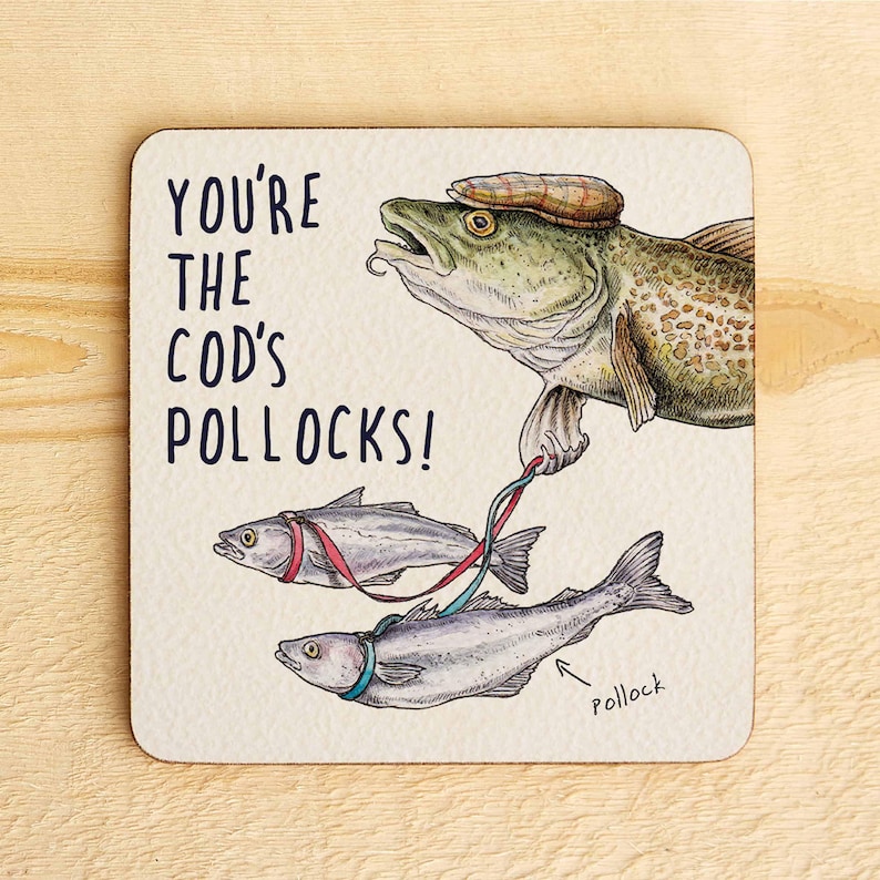 May include: A white card with a humorous illustration of a cod fish wearing a hat and holding two smaller fish on leashes. The text on the card reads "You're the cod's pollocks!"