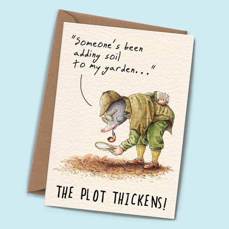 May include: A humorous greeting card featuring a cartoon mole wearing a detective hat and holding a magnifying glass. The text on the card reads "Someone's been adding soil to my garden..." and "The plot thickens!"