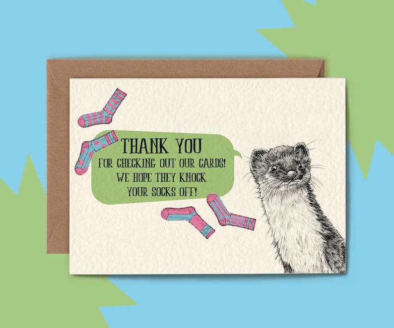 May include: A greeting card with a cartoon illustration of a weasel and several socks. The card has the text "THANK YOU FOR CHECKING OUT OUR CARDS! WE HOPE THEY KNOCK YOUR SOCKS OFF!" in a green speech bubble.