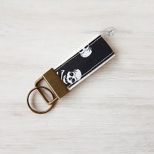 Lanière, lanière, porte-clés, tête de mort, noir, blanc, or antique