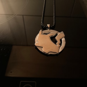 Pikachu silhouette sterling silver pendant