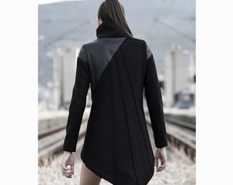 Abrigo Jagger: Abrigo negro de vanguardia, chaqueta asimétrica futurista, prenda de abrigo minimalista cyberpunk.