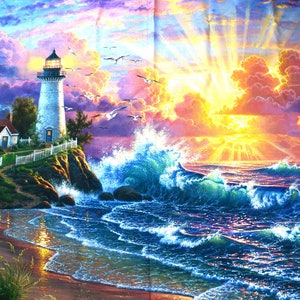 May include: A white lighthouse with a black roof stands on a rocky cliff overlooking a blue ocean with white-capped waves. A small white house with a green roof is in the foreground. The sky is a vibrant mix of purple, pink, orange, and yellow with a bright sun shining through the clouds.