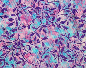 May include: Purple leaf pattern on a pink and blue tie-dye fabric background.