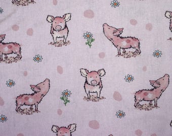 May include: Light pink fabric with a repeating pattern of cartoon pigs, daisies, and pink polka dots. The pigs are pink with black outlines and are in various poses. The daisies have white petals and yellow centers.
