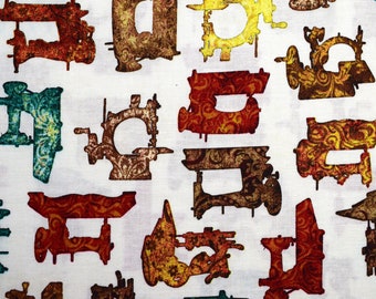 May include: A white fabric with a repeating pattern of colorful sewing machines. The sewing machines are outlined in brown, red, green, and yellow. The fabric has a vintage look.