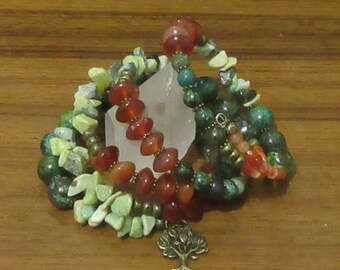 Charm Bracelets Gemstone: African Turquoise, Yellow Turquoise Chips, Carnelian Saucers & Rounds, 5 strand Memory-wire, 2 Tree of Life Charms