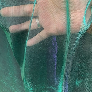 Shiny Metallic mesh see though fabric 2-way stretch 58/60” Sold by the YD. Ships Worldwide from Los Angeles California USA.