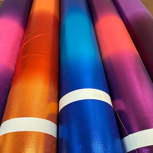 New ombré foggy foil 2-tone metallic nylon spandex 4-way stretch 58/60” Sold by the YD. Ships worldwide from Los Angeles California USA.