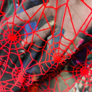 Spiderweb design nylon power mesh with flocking 4-way stretch 58/60” Sold by the YD. Ships Worldwide from Los Ángeles California USA.