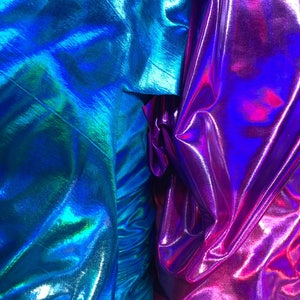 New iridescent all over foil turquoise and fuschia nylon spandex 4way stretch 58/60&quot; Sold by the YD. Ships worldwide from Los Angeles CA USA