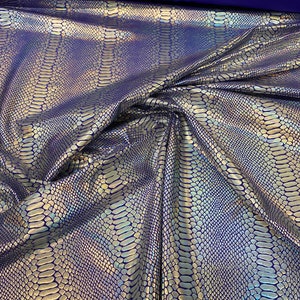 New Iridescent snake design purple/silver metallic hologram nylon spandex 4-way stretch 58/60” Sold by the YD. Ships worldwide from L.A CA.
