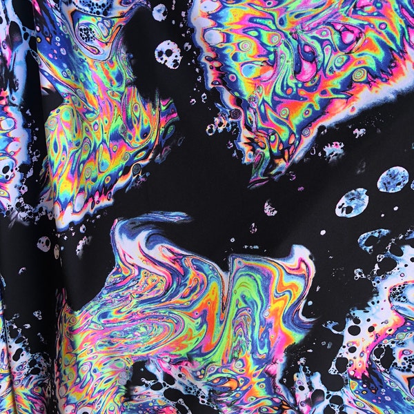 New nylon spandex abstractive design black/multicolor 4way stretch 58/60" Sold by the YD. Ships Worldwide from Los Angeles California USA