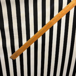 Stripes design print on best quality of nylon spandex 4-way stretch 1” stripe size 58/60” Sold by the YD. Ships worldwide from Los Angeles