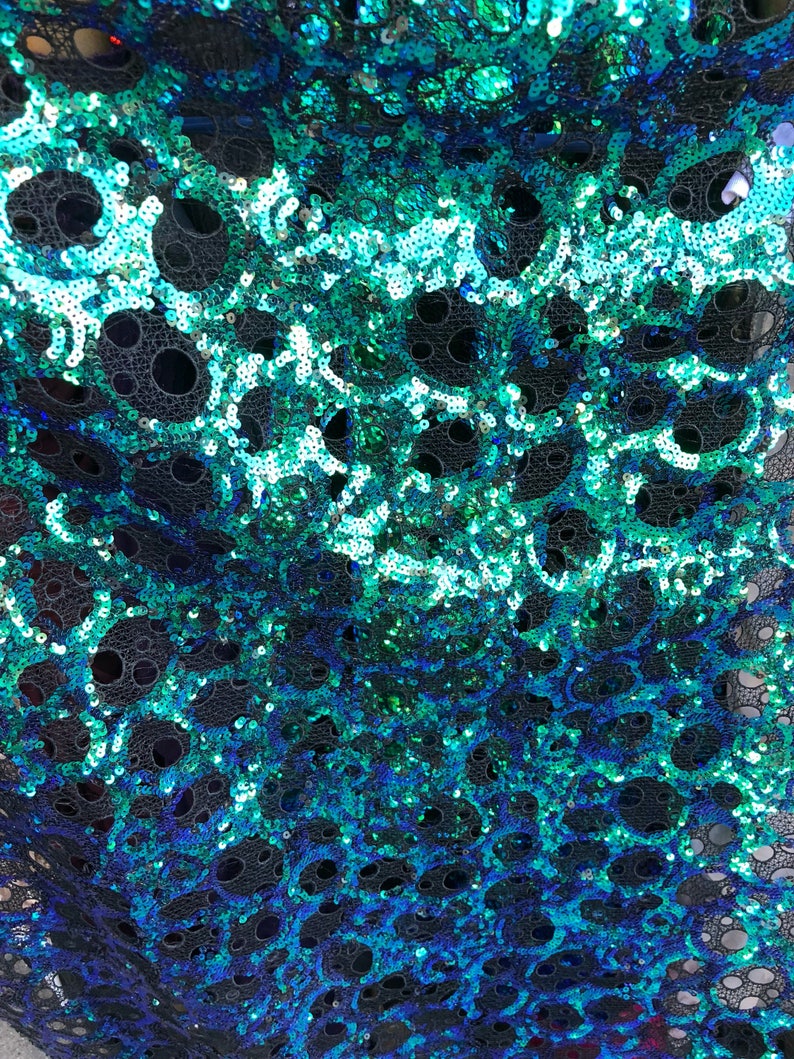 New lace with sequins oval design iridescent peacock color non Stretch 5052 Sold by ghe YD Ships worldwide from Los \u00c1ngeles CA USA