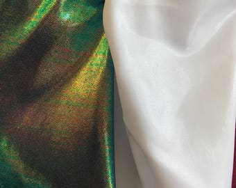 Foggy foil iridescent green & white clear metallic nylon spandex 4way 58/60" Sold by the YD. Ships worldwide from Los Angeles CA