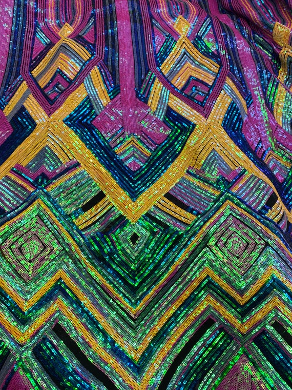 幾何学模様のストレッチボトムス 幾何学模様のストレッチボトムス 新作。幾何学模様のマルチカラー