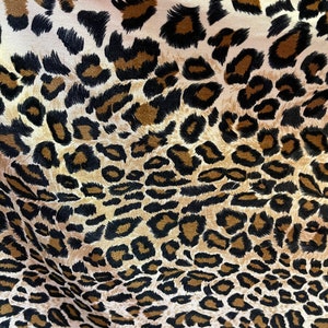 Leopard design Exotic animal print on great quality of stretch velvet 4-way stretch 58/60” Sold by the YD. Ships Worldwide from Los Angeles