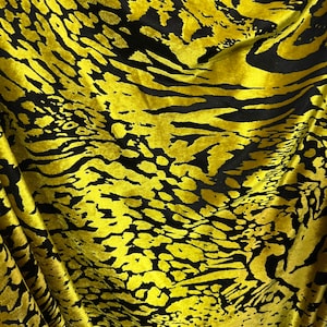 New Exotic animal print design on burnout luxury stretch velvet 4-way stretch 58/60” Sold by the YD. Ships Worldwide from Los Angeles  Calif