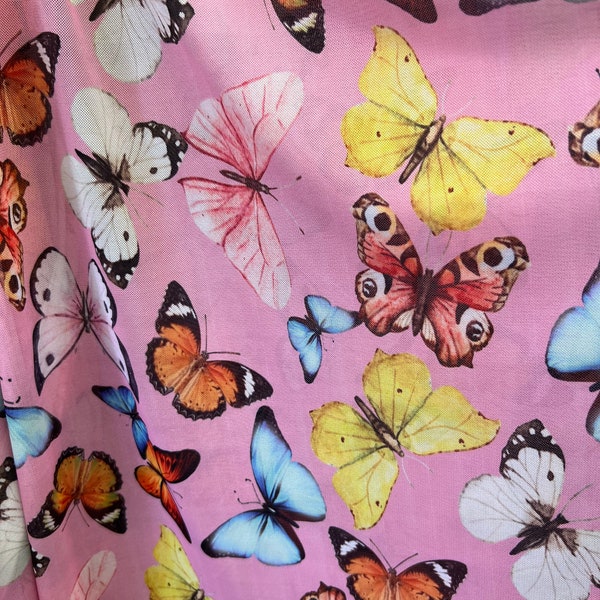 Butterfly design Pink Multicolor print on great quality of power mesh 4-way stretch 58/60” Sold by the YD. Ships Worldwide from Los Angeles