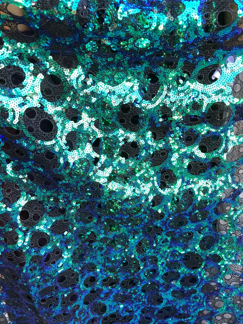 New lace with sequins oval design iridescent peacock color non Stretch 5052 Sold by ghe YD Ships worldwide from Los \u00c1ngeles CA USA