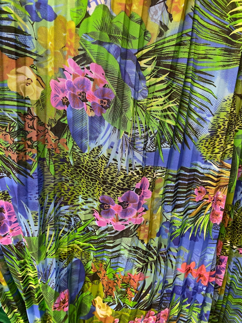 Ships worldwide from Los Angeles CA USA. New Hiding Exotic Leopard design print on pleated power mesh 4-way stretch 5860\u201d Sold by the YD