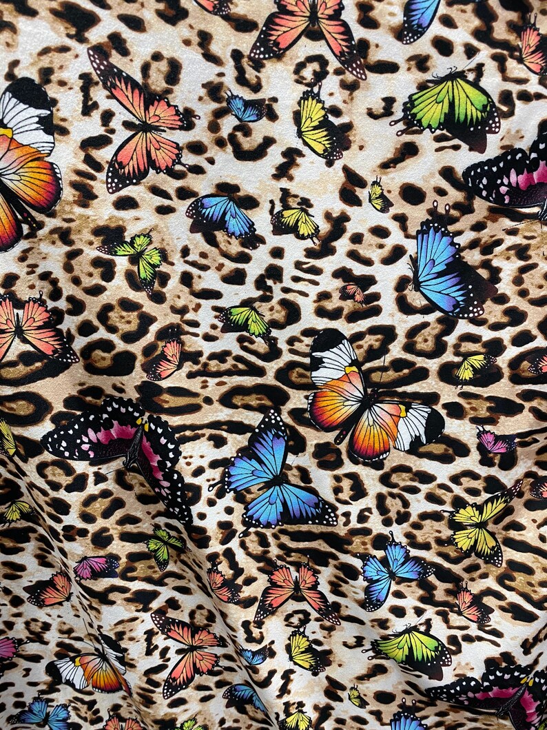 Ships Worldwide from Los Angeles California USA. New butterfly design print on soft poly cotton spandex 4-way stretch 5860\u201d Sold by the YD