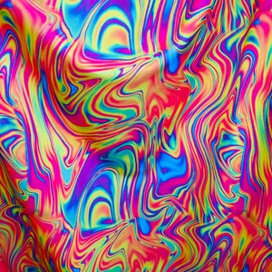 New abstract design lava multicolor print on great quality of nylon spandex 4-way stretch 58/60” Sold by the YD. Ships Worldwide from L.A CA