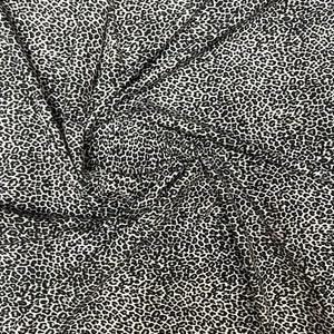 Exotic leopard design white/black small size print on great quality of nylon spandex 4-way stretch 58/60” Sold by the YD. Sold by the YD.