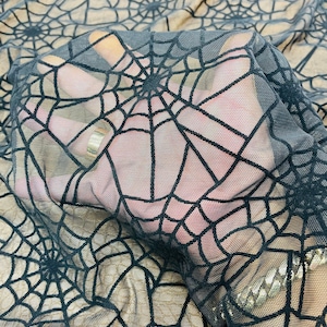 Spiderweb design best quality of stretch power mesh with black flocking 4-way stretch 58/60” Sold by the YD. Ships Worldwide from L.A CA