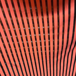 New stripes design nylon spandex with mesh stripes  white/black 4-way stretch 58-60” sold by the YD. Ships worldwide from Los Angeles Califo
