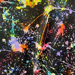 New splatter paint design print on nylon spandex 4-way stretch 58/60” Sold by the YD. Ships worldwide from Los Angeles California USA.