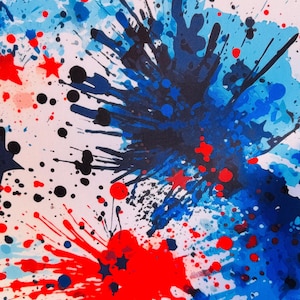 May include: Abstract pattern featuring red, white, and blue paint splatters and star shapes. The design includes various sizes of splatters and dots, creating a dynamic and energetic visual effect. The color scheme evokes a patriotic theme.