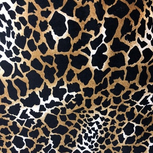 Giraffe design print on good quality stretch velvet 4way 58/60&quot; Sold by the YD. Ships worldwide from Los Angeles California USA.