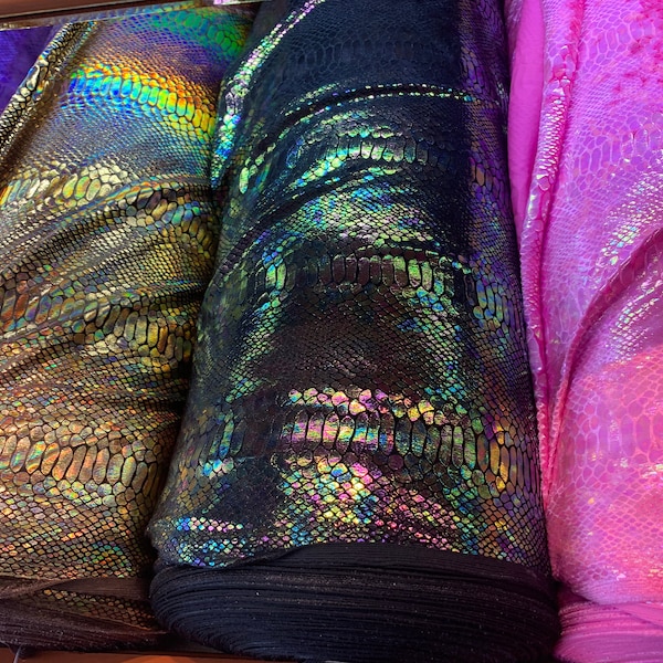 New Iridescent Alligator design hologram clear ilusión foil on heavy stretch velvet 4way stretch 58/60” Sold by the YD. Ships worldwide