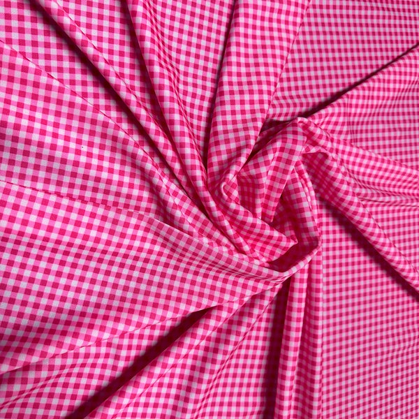 Gingham design 1/4” Hot pink color print on great quality of nylon spandex 4-way stretch 58/60”