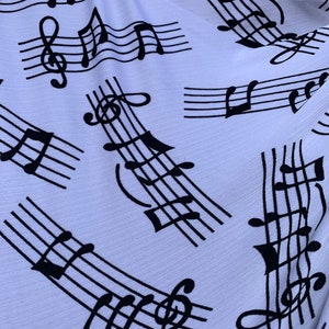 Ontwerpprint met muzieknoten op zware nylon spandex 4-way stretch 58/60&quot; Verkocht door de YD. Wordt wereldwijd verzonden vanuit Los Angeles, Californië, VS.
