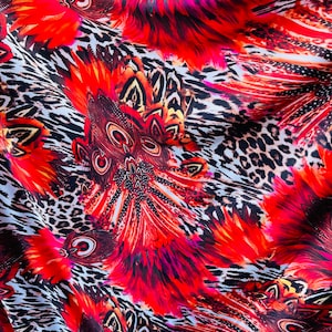 New Exotic peacock design animal print on poly spandex 4-way stretch medium weight 58/60” Sold by the YD. Ships Worldwide from Los Angeles