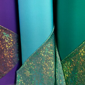 New Shatter glass metallic nylon spandex broken glass hologram 4way stretch 58/60&quot; Sold by the YD. Ships worldwide from Los Angeles CA.